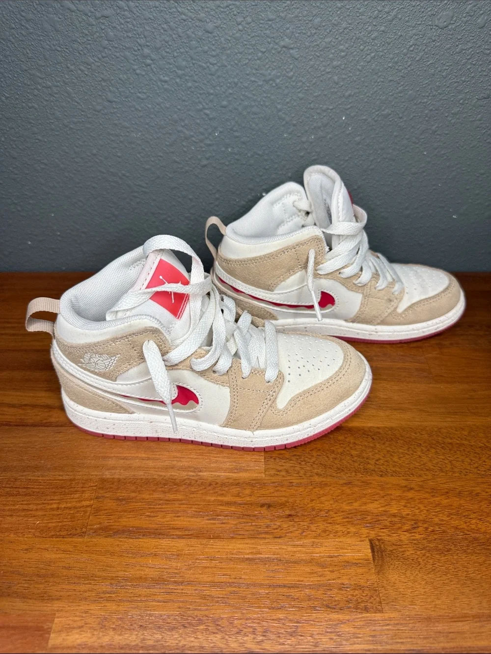 Nike Jordan 1 Mid-Top Sneakers in Beige, White & Pink